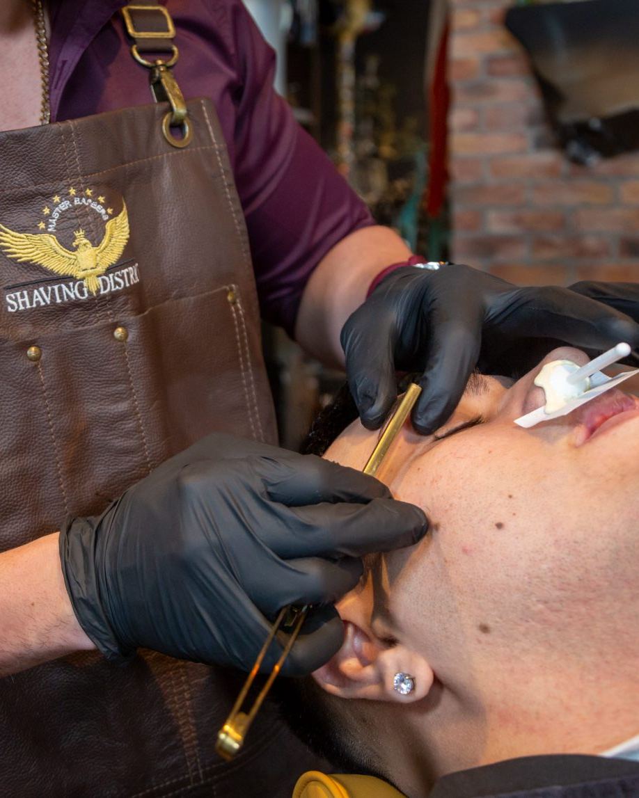 Straight-razor shave in progress